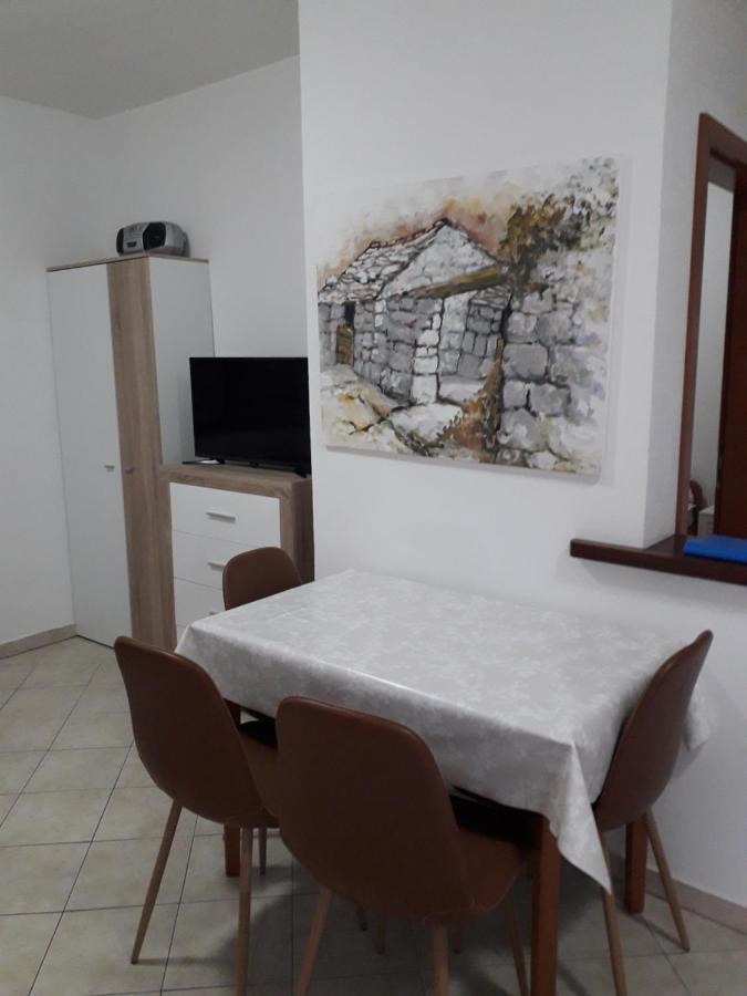 Apartments Maslina ลุมบาร์ดา ภายนอก รูปภาพ