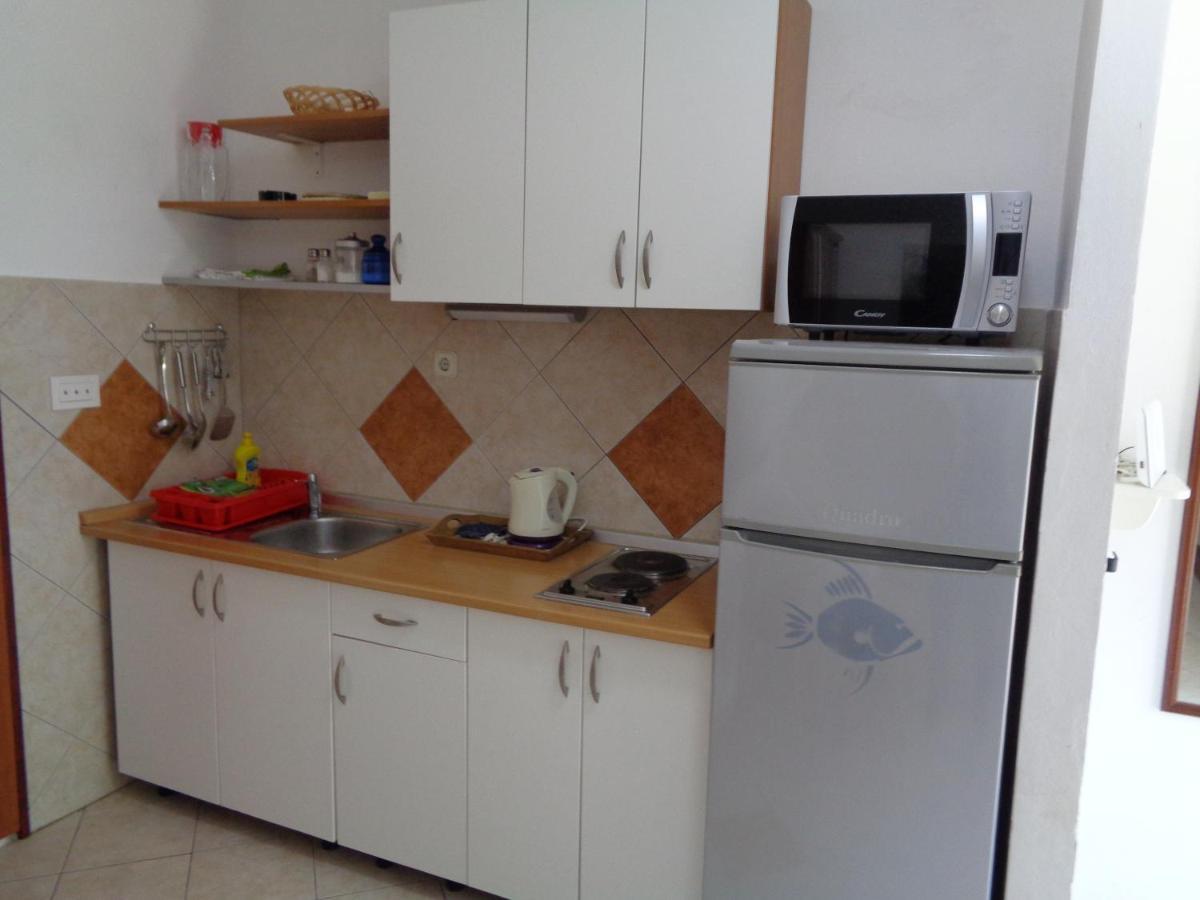 Apartments Maslina ลุมบาร์ดา ภายนอก รูปภาพ