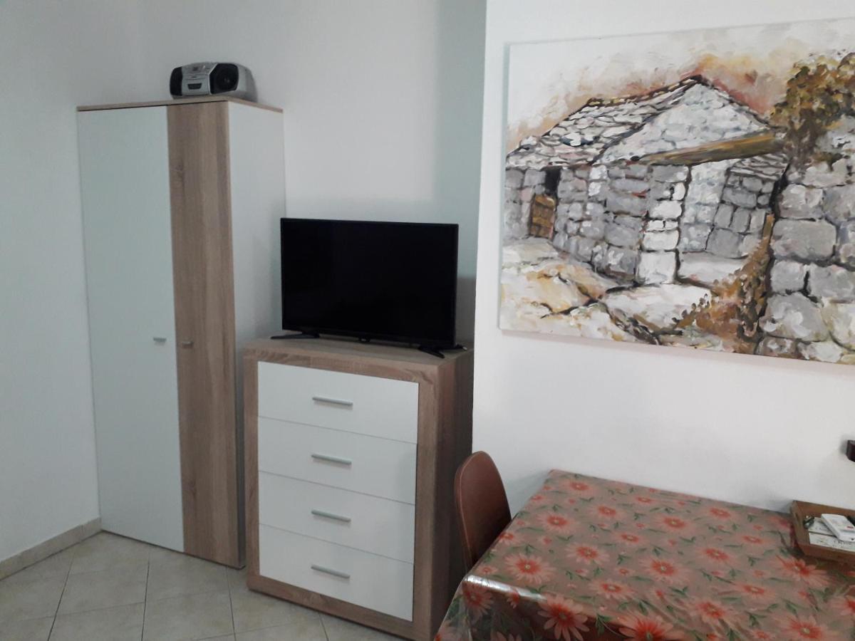 Apartments Maslina ลุมบาร์ดา ภายนอก รูปภาพ