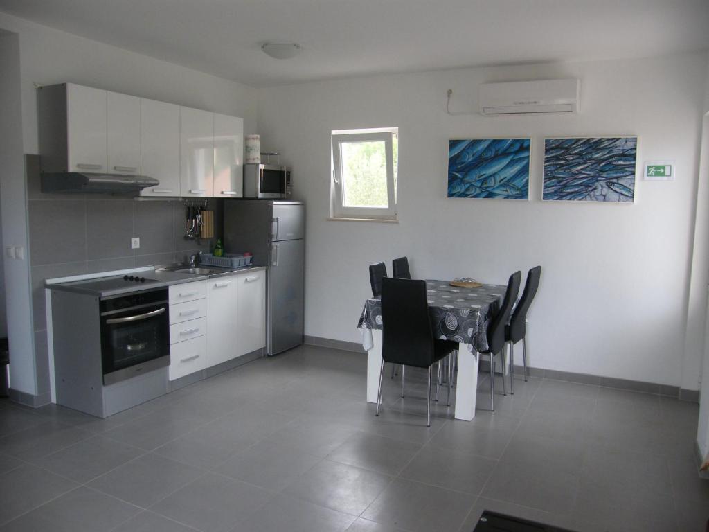 Apartments Maslina ลุมบาร์ดา ห้อง รูปภาพ