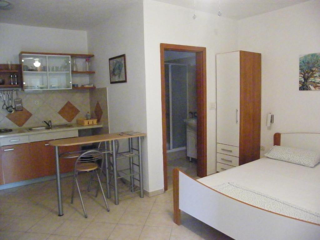 Apartments Maslina ลุมบาร์ดา ห้อง รูปภาพ