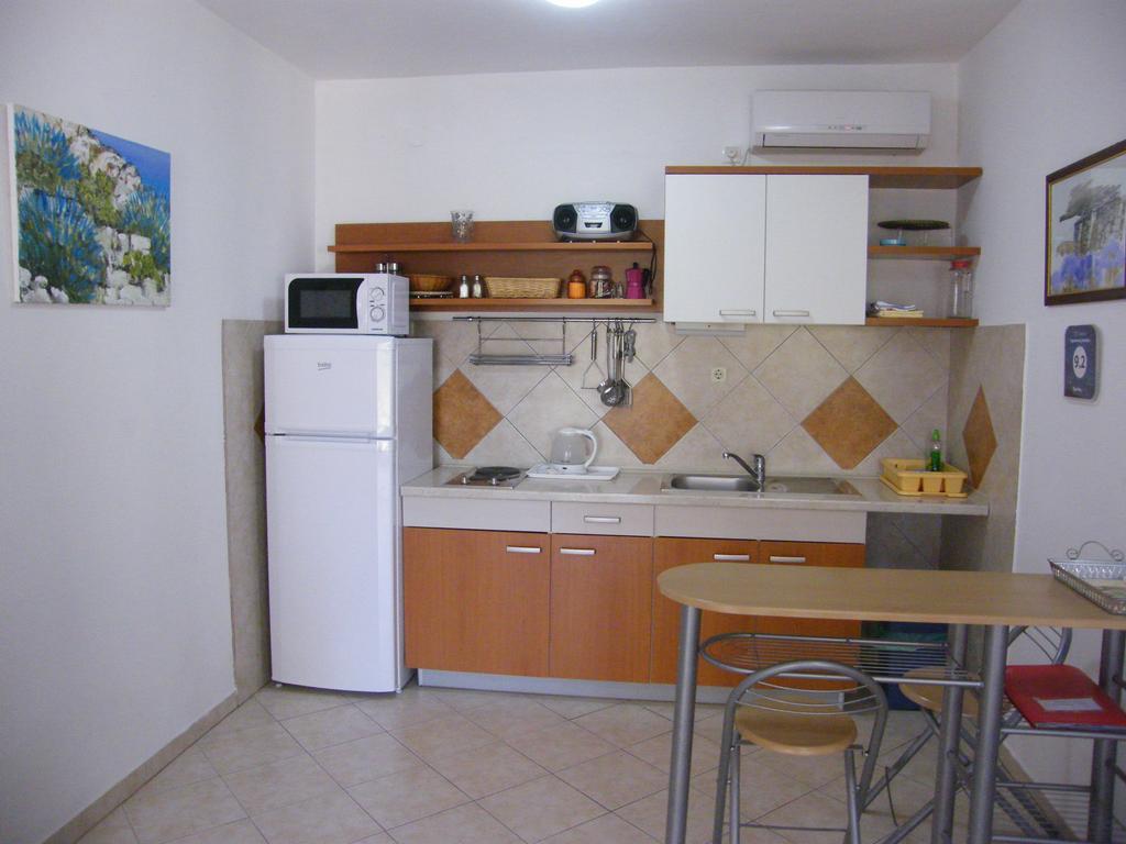 Apartments Maslina ลุมบาร์ดา ภายนอก รูปภาพ
