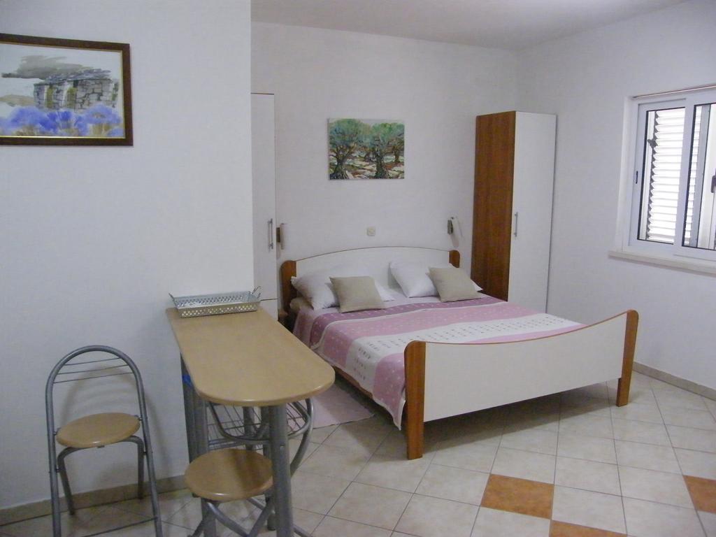 Apartments Maslina ลุมบาร์ดา ภายนอก รูปภาพ
