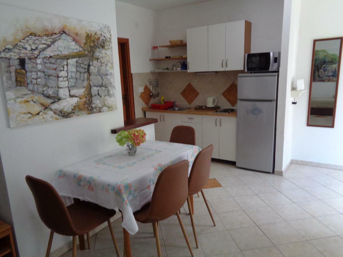 Apartments Maslina ลุมบาร์ดา ภายนอก รูปภาพ